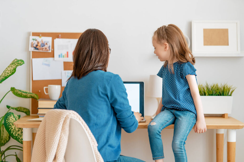 Mom on computer with daughter sitting on desk. Its ok to admit you have secondary trauma from parenting a kid healing from childhood trauma. You need support too. Learn about the effects of trauma and get the support you need.  Gulfport, MI 39501
Chicago, IL  60601 | 60602 | 60603 | 60604
